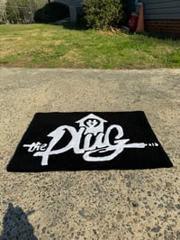 Image 3 of The Plug Rug 