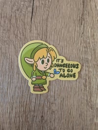 Image 1 of It's Dangerous to go Alone - Vinyl Laminate Sticker