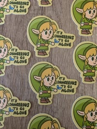 Image 2 of It's Dangerous to go Alone - Vinyl Laminate Sticker