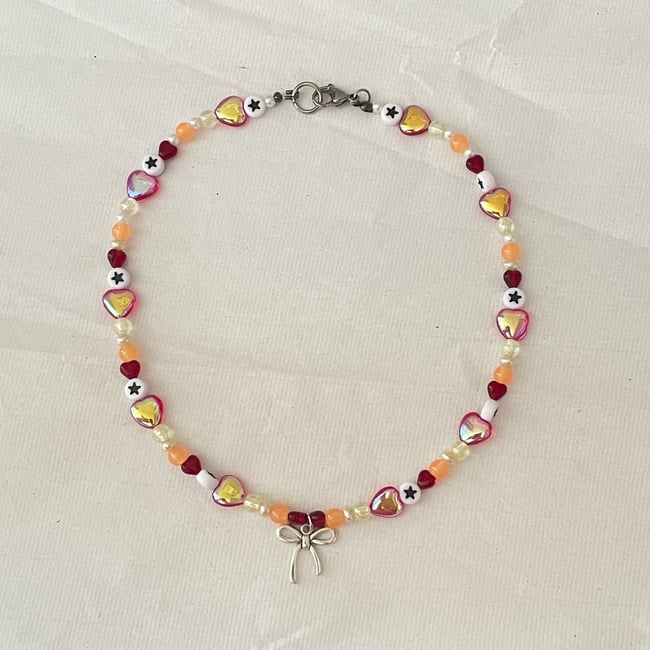 kiki's bow heart necklace