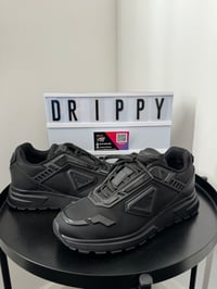 Image 1 of Exclusive Low Black Prada Sneakers