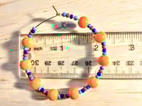 Image 2 of Daisy Orange, Sapphire Blue, Ocean Blue, and Red Multicolor Beaded Medium Hoop Earrings