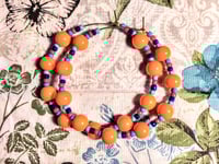 Image 9 of Daisy Orange, Sapphire Blue, Ocean Blue, and Red Multicolor Beaded Medium Hoop Earrings
