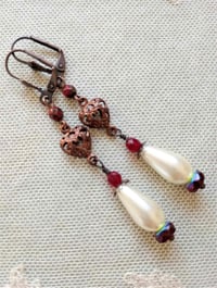 Image 6 of Renaissance copper filigree hearts long earrings handmade with red faceted & ivory glass pearl beads