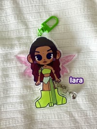 Image 6 of katseye 'winxeye' moveable wing keychains.