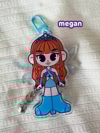 Image 4 of katseye 'winxeye' moveable wing keychains.