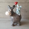 Donkey and blue rabbit. Hand made pottery.