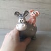 Donkey and pig. Handmade pottery.