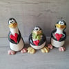 Valentine penguins. Hand made pottery