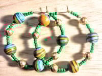 Image 1 of Orange-Blue Multi, Leaf Green, and Gold Multicolor Beaded Medium Hoop Earrings