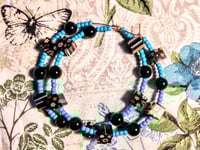 Image 9 of Black-Orange Multi, Ocean Blue, and Onyx Black Multicolor Beaded Large Hoop Earrings