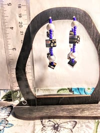 Image 5 of Black-Orange-Blue Multi, Royal Blue, and White Multicolor Beaded Medium Hoop Earrings