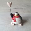 Pink balloon penguin