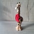 Giraffe in a  scarf Image 3