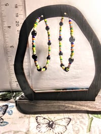 Image 5 of Viola Black, Leaf Green, Yellow, and Orange Multicolor Beaded Large Hoop Earrings