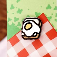 Image 1 of Tiny Egg on Toast Enamel Pin
