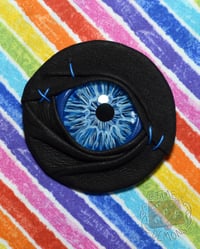 Image 1 of Rough Blue Cy Eye Pin