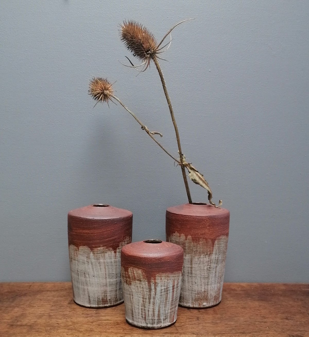 Image of Red clay bisque slipped trio of Vases. Winter Sale 