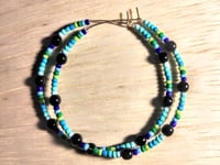 Image 1 of Viola Black, Leaf Green, and Blue Multicolor Beaded Large Hoop Earrings