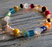 Image 1 of "Fun and flirty" colorful glass bead stretch bracelet 