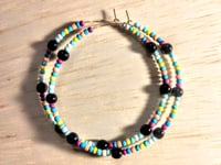 Image 1 of Viola Black, Lemon Yellow, Blue, and Magenta Multicolor Beaded Large Hoop Earrings
