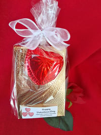 Valentine Gold tote filled with creamy caramels