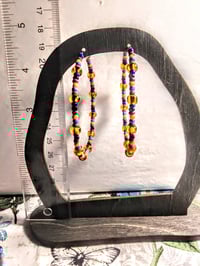 Image 5 of Plumeria Orange, Ocean Blue, Black, and Burgundy Multicolor Beaded Large Hoop Earrings