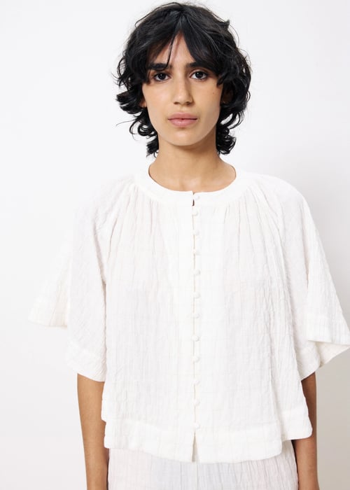 Image of 1-Blusa blanca 