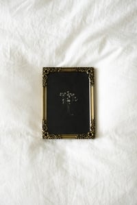Image 1 of dainty
