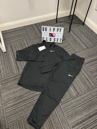 Image 1 of Nike Running Reflective Tracksuit