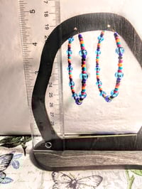 Image 5 of Sky Blue, Daisy Orange, Magenta, and Dark Blue Multicolor Beaded Large Hoop Earrings