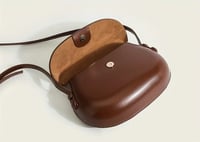 Image 3 of Leather handbag with a rounded shape Brown