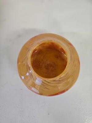Image of Sand with orange bowl vase