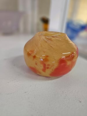 Image of Sand with orange bowl vase