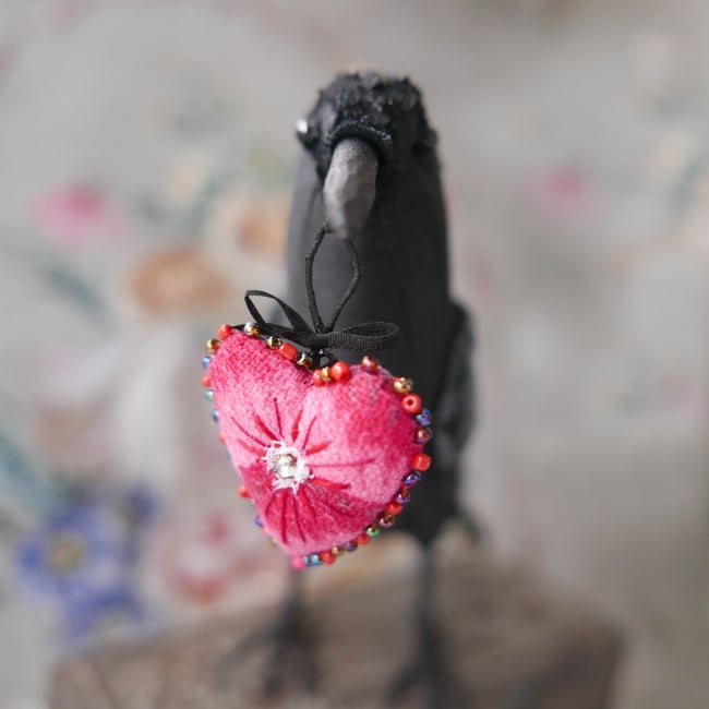 Huginn, a black crow