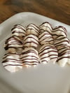 A dozen chocolate covered fortune cookies 