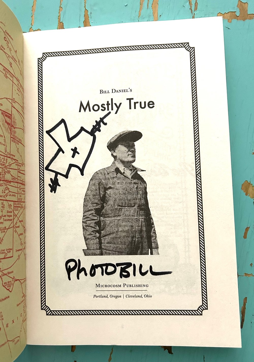 Mostly True book (3rd edition, signed by Bill Daniel)