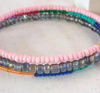 Image 2 of Dainty boho pink, orange and blue seed bead memory wire charm bracelet 