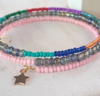 Image 3 of Dainty boho pink, orange and blue seed bead memory wire charm bracelet 