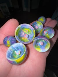 Image 4 of Shades of purple and lemon drop scribble marbles