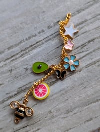 Image 2 of Fun and colorful Spring inspired purse charm 