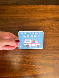 Image 1 of Public Services Over Profit Sticker