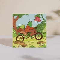 Image 2 of Frogs Riding a Bike