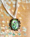 Van gogh’s roses in vintage pendant