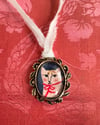 Mona Kitty in vintage pendant