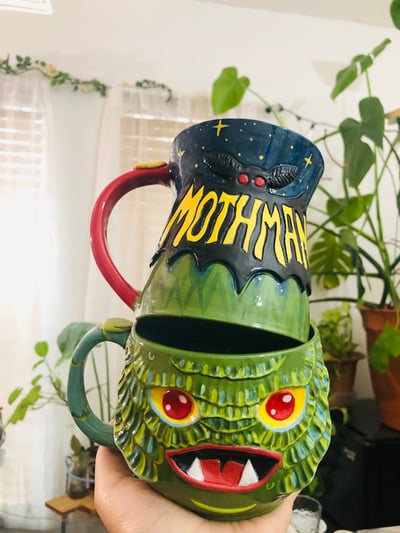 Image of Mothman mug and creature for Emily