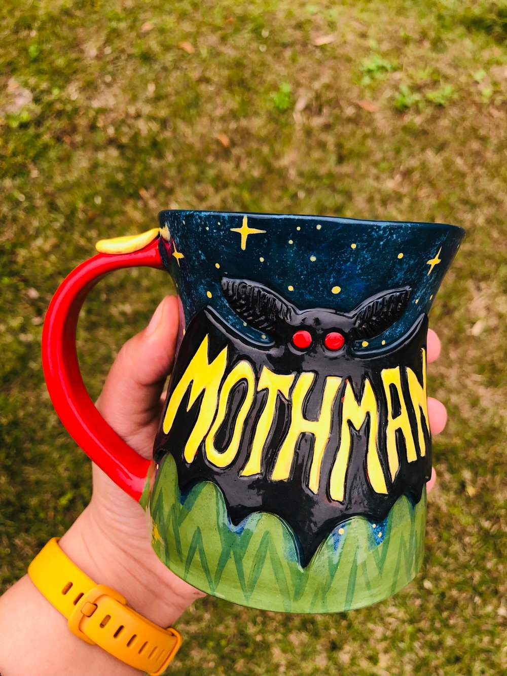 Image of Mothman mug and creature for Emily