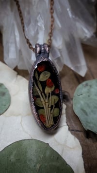 Image 1 of Skeleton Hand Pendant - Red Floral