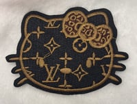 Image 1 of LV iron on patches 