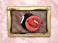 Image 1 of 8 Ball Mouth Tongue Pulled Out In Frame